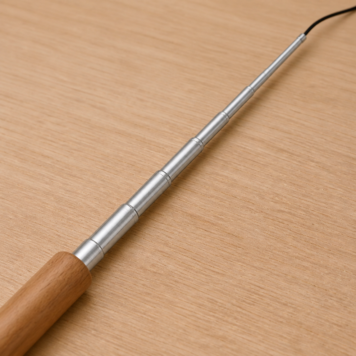 Retractable Feather Wand — Solid wood handle