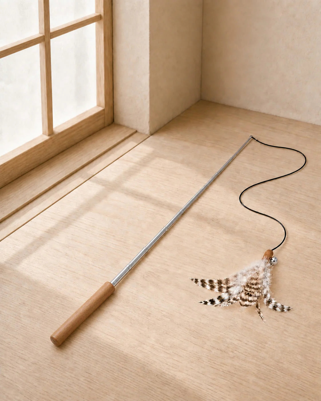 Cat engaging with the straight seven-section Retractable Feather Wand
